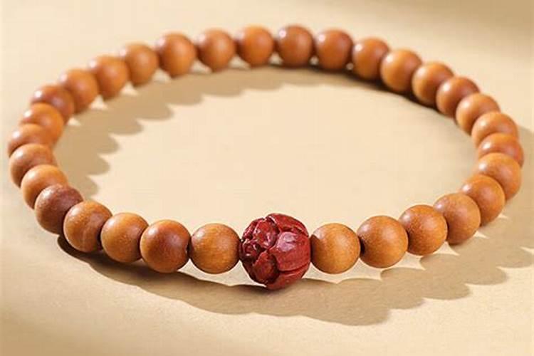 本命年戴朱砂好还是桃木好？